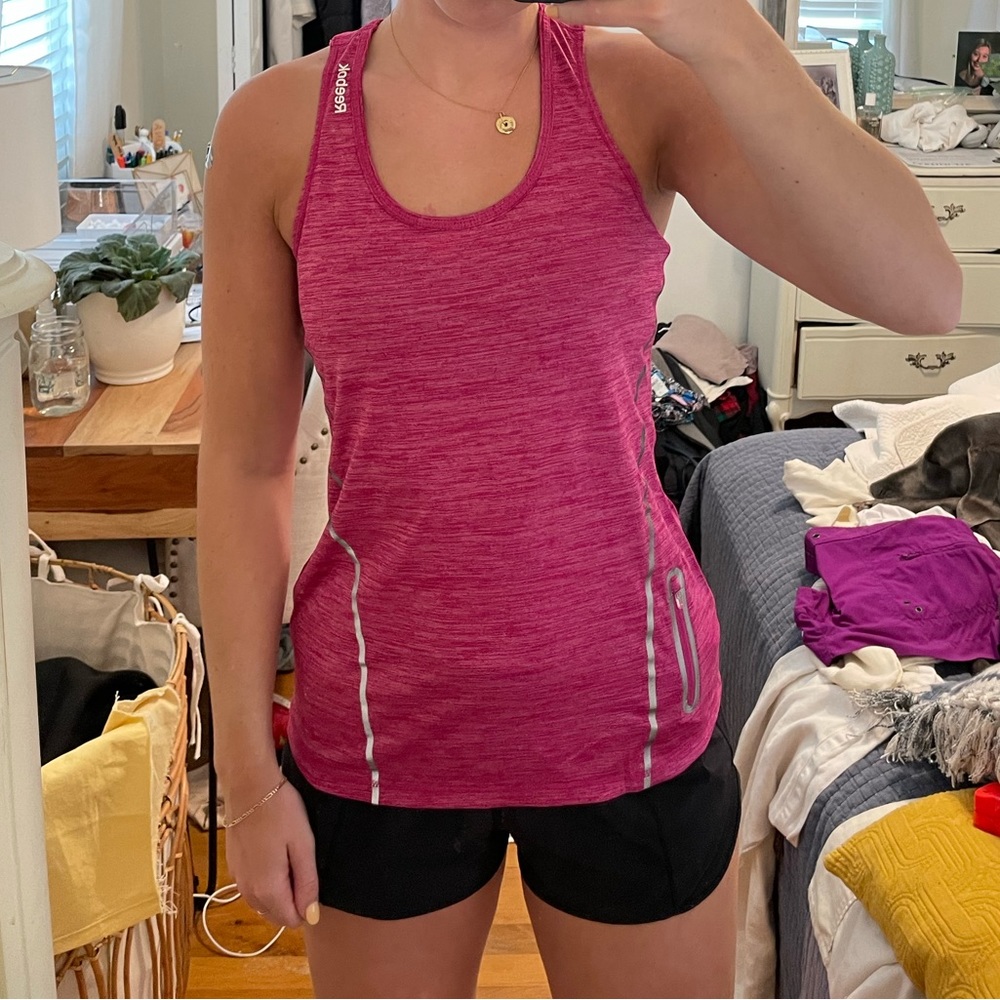 Rebook Women’s Racing Racerback Tank Top in Pink